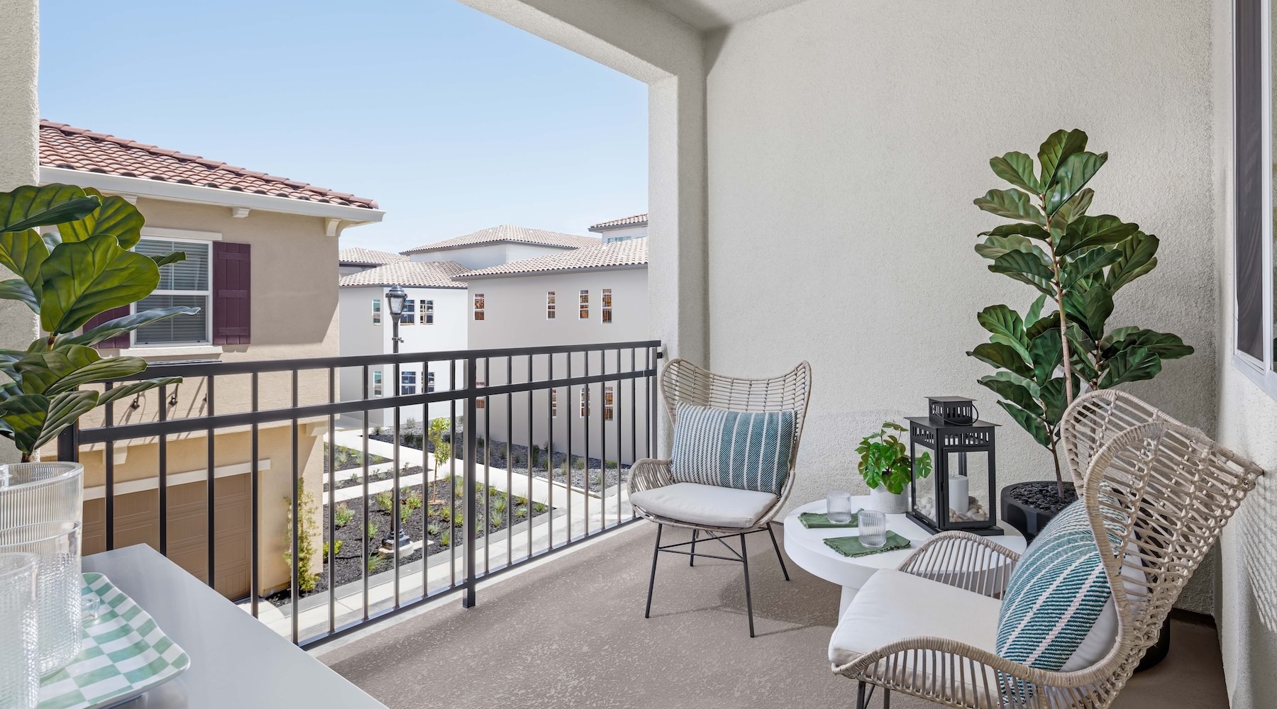 a patio with a table and chairs