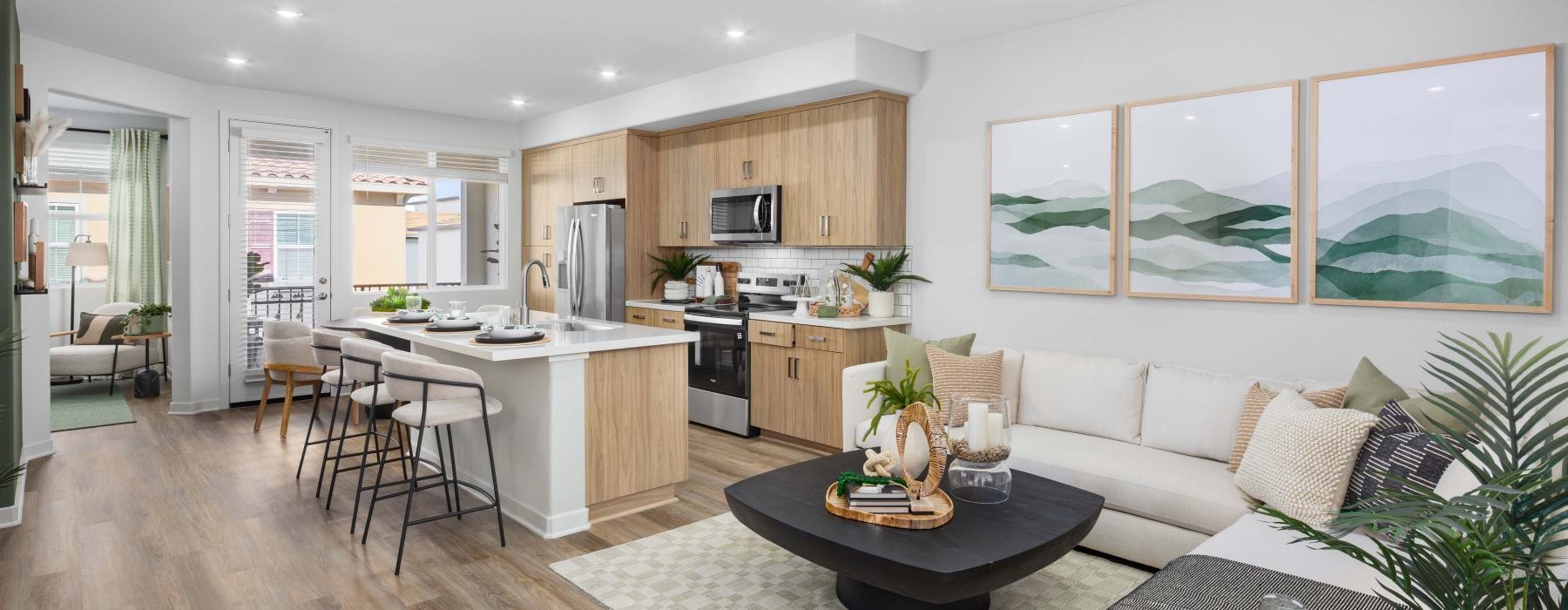 a large living room with a large kitchen and dining area