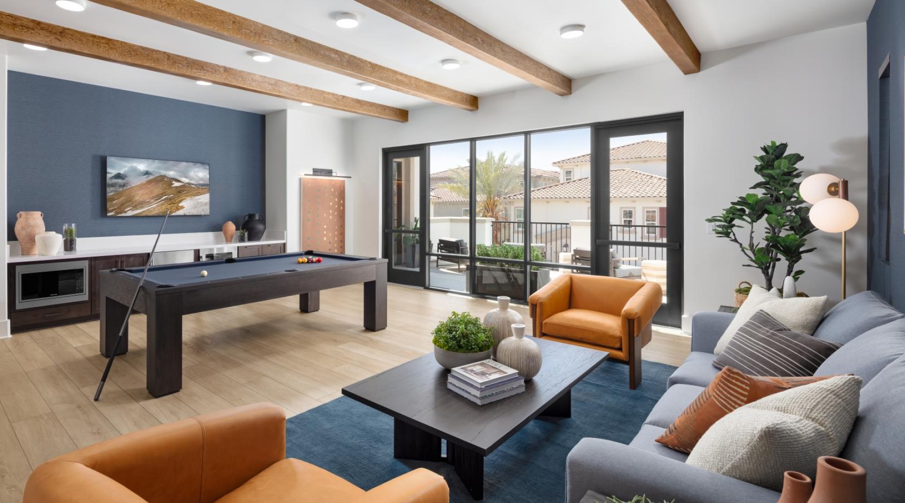 a living room with a large glass wall